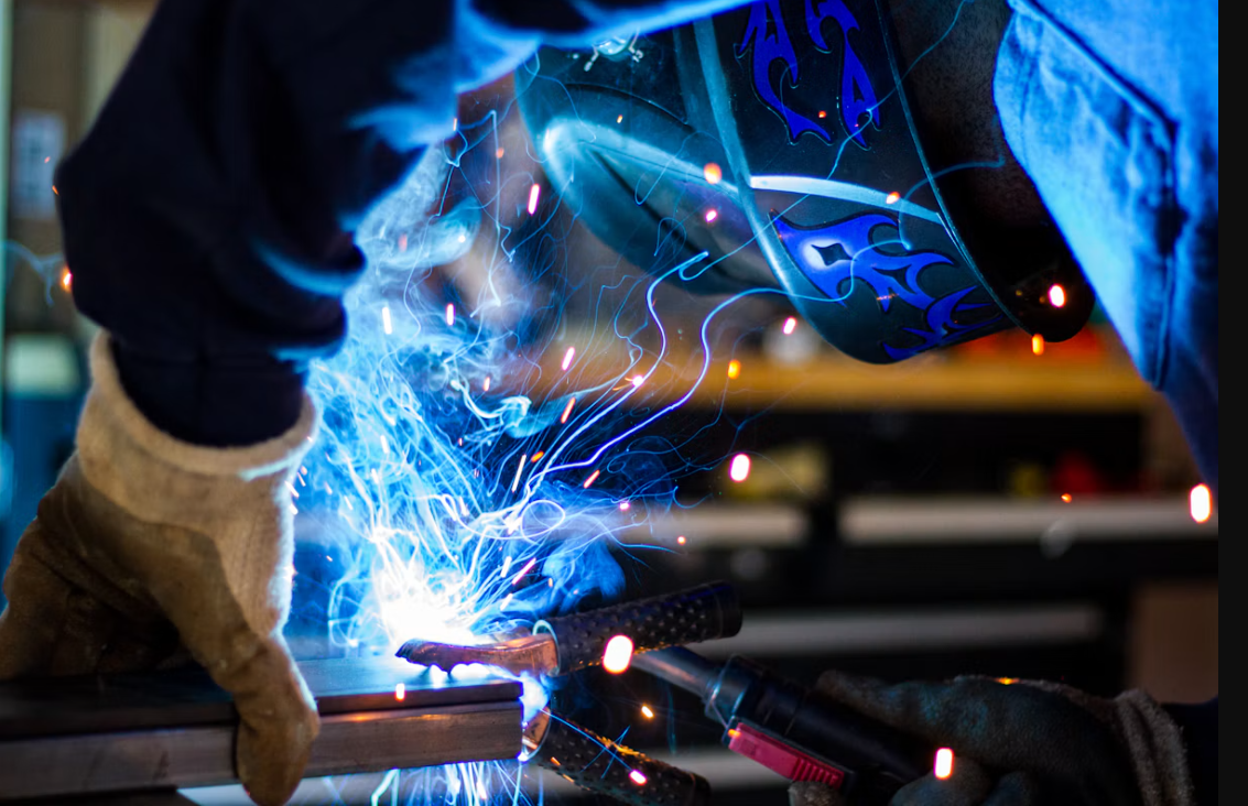 Metalworking with sparks during fabrication